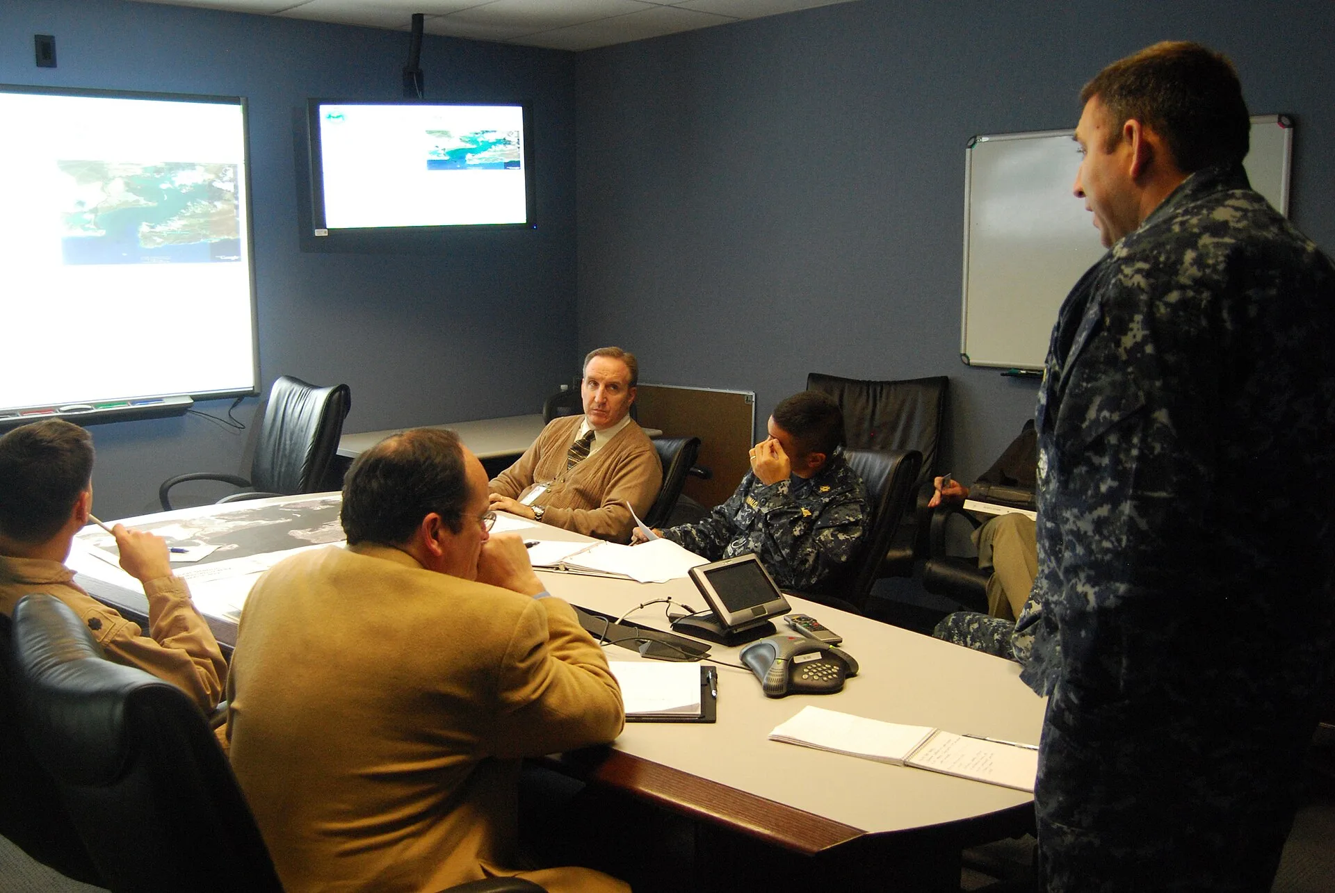 JACKSONVILLE, Fla. (Jan. 28, 2010) Crisis action team members hold a teleconference with base and staff representatives assisting with earthquake relief efforts in Haiti. The daily teleconference provides the crisis action team updates on the priorities outlined in their twice-a-day situational summ. Delay versus distortion: what actually slows crisis communications
