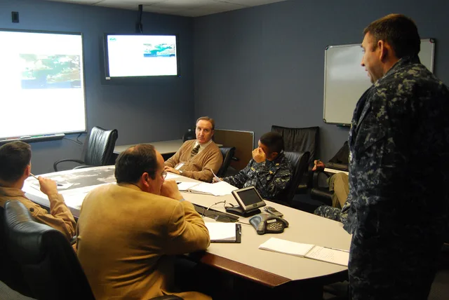JACKSONVILLE, Fla. (Jan. 28, 2010) Crisis action team members hold a teleconference with base and staff representatives assisting with earthquake relief efforts in Haiti. The daily teleconference provides the crisis action team updates on the priorities outlined in their twice-a-day situational summ. Delay versus distortion: what actually slows crisis communications