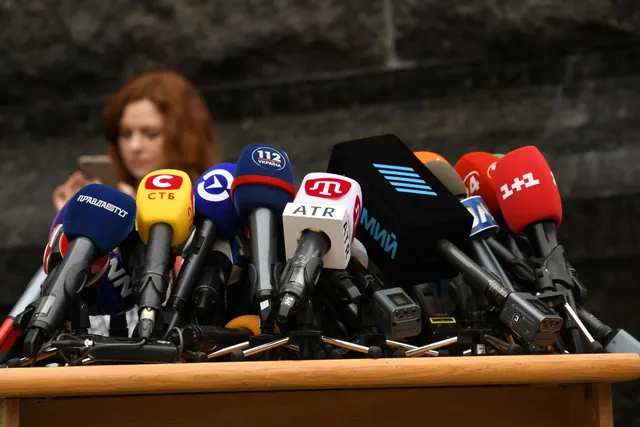 Various microphones setup at a press conference in Kyiv, Ukraine. Public relations strategy: a practical guide for 2027