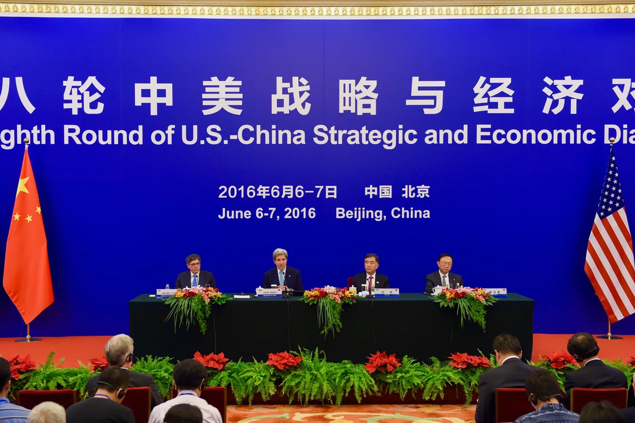 Officials address reporters from a stage during a joint press statement in Beijing.